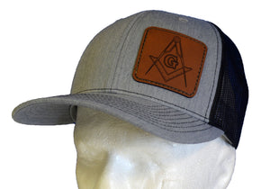 Hat with leather patch